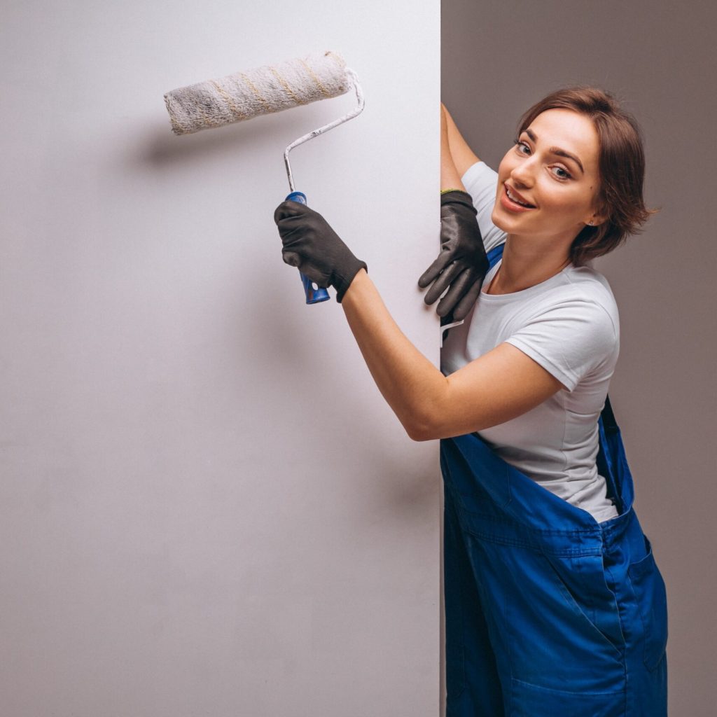 woman-repairer-with-painting-roller-isolated-min